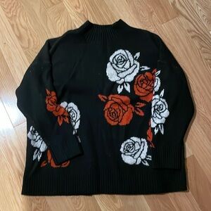 Torrid black sweater with white and red roses